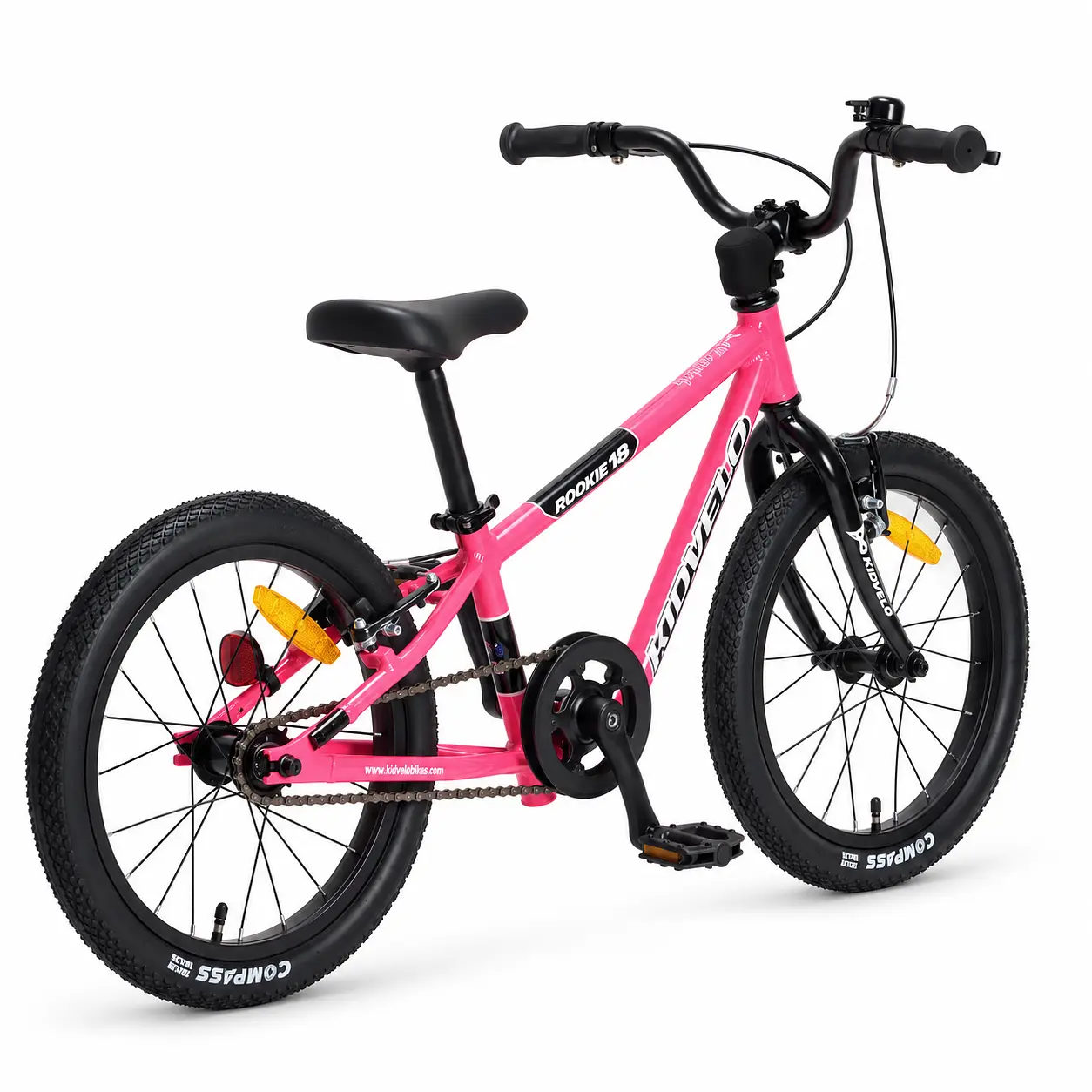 Pink Kidvelo Rookie 18 convertible kids bike in pedal mode from a rear-angle studio view, showing its lightweight frame, chain drive and air tyres.