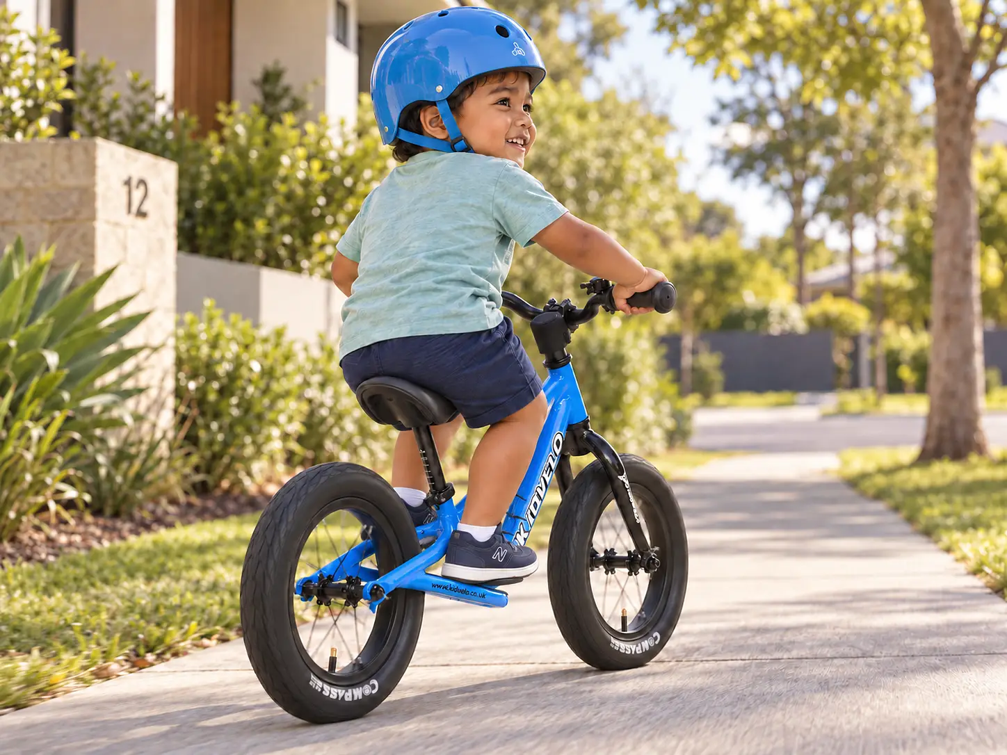 Child Learning To Balance And Glide On A Kidvelo Rookie 12 Balance Bike